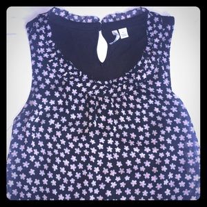 Elle sleeveless blouse with a pretty floral print.